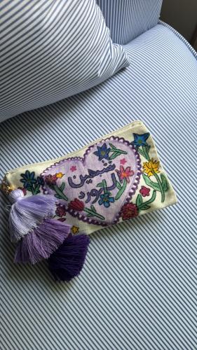 Cloth bag with hand-painted design