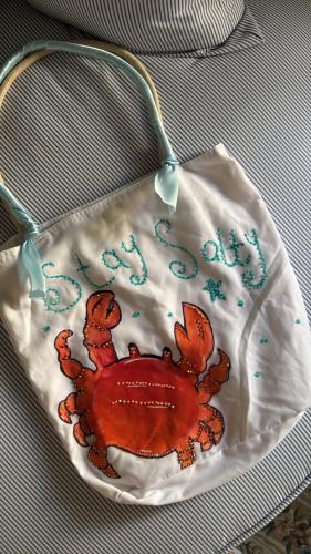 A shoulder bag decorated with crystals