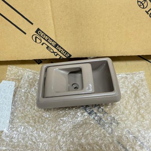 Inner beige door handle on the left side, pickup t...