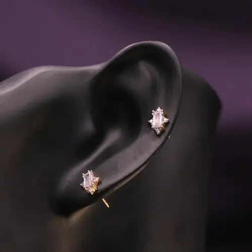925 sterling silver and gold earrings with a recta...