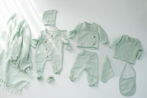 طقم استقبال مواليد 10 قطع قطن موسلين أخضر فاتح -صن...
