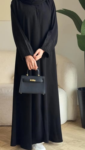 عباية تولاي