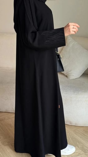 عباية تولاي