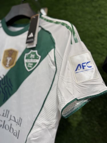 تيشيرت الاهلي الاساسي مع شعارات ( النخبة )