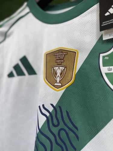 تيشيرت الاهلي الاساسي مع شعارات ( النخبة )