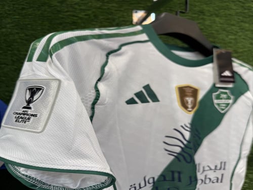 تيشيرت الاهلي الاساسي مع شعارات ( النخبة )