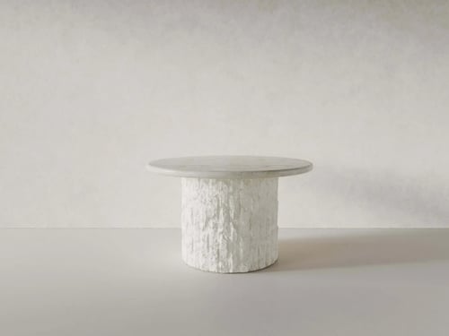 طاولة طعام مستديرة حجرية منحوته