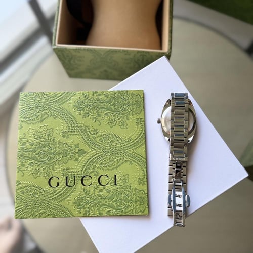 ساعه قوتشي + ملحقات ماستر