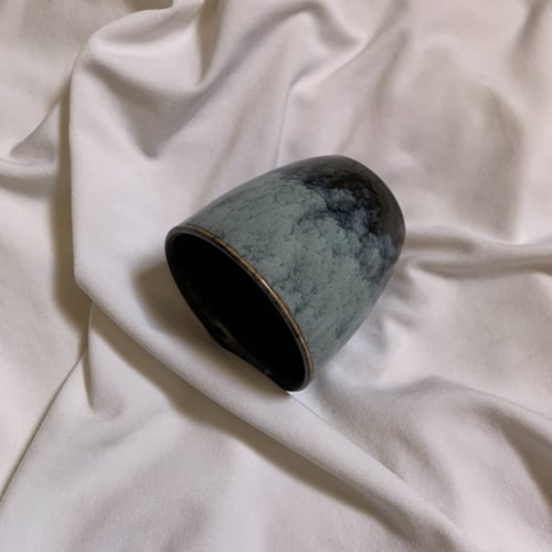 كوب فخار مُلَبَّد .