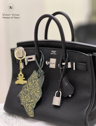 علاقة شنطة جلد لليوم الوطني