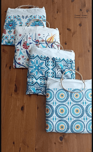 روب بحر مع شنطة + منشفة بحر مع شنطة - بيت نايا