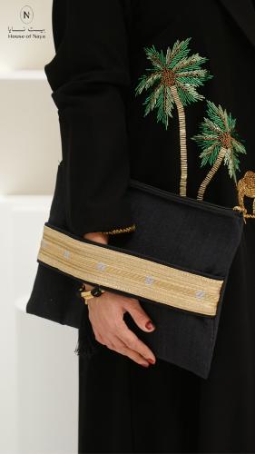 شنطه كلتش بتطريز الخيط الذهبي