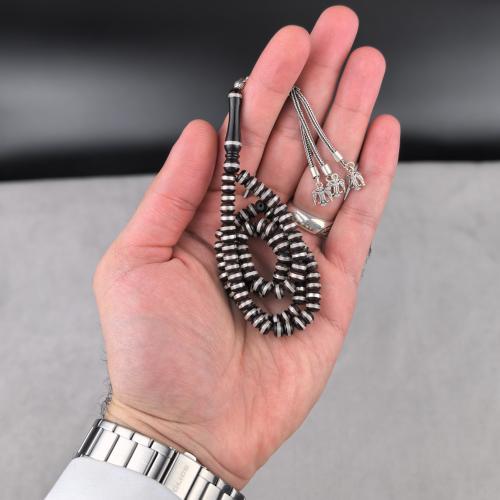 مسباح كوك بالفضة 99