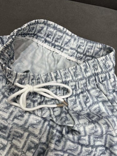 بنطلون رمادي /ابيض موديل 1315