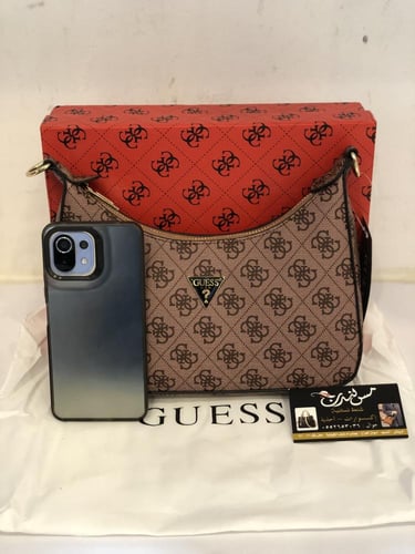 شنطة وسط بني 1019