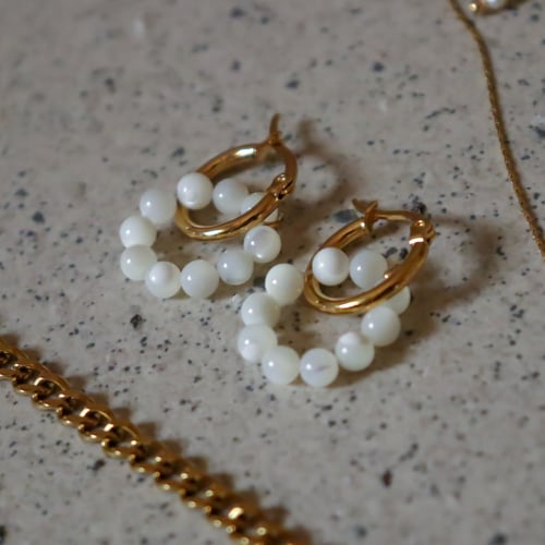 أقراط لارا الذهبية من الصدف الطبيعي و الستانلس ستي...