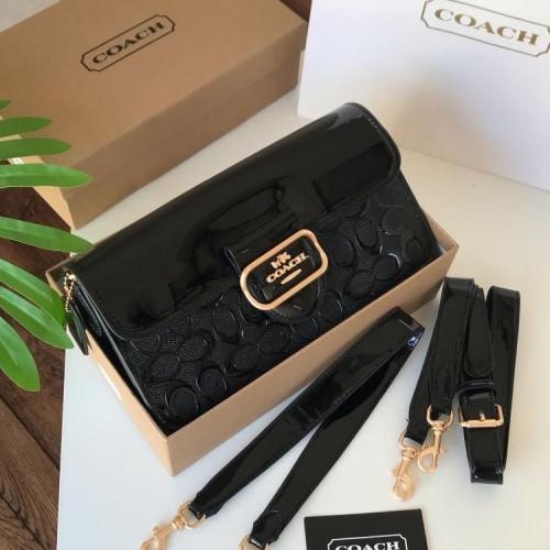 شنطة كوتش بلون بني