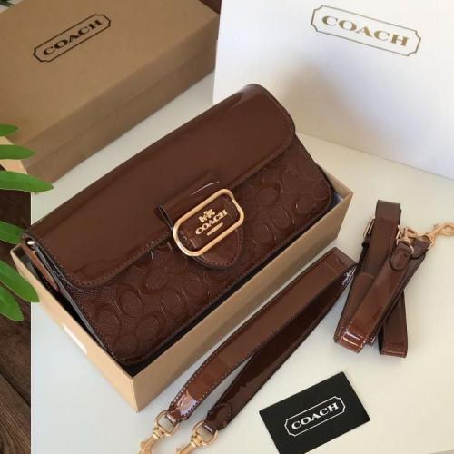 شنطة كوتش بلون بني