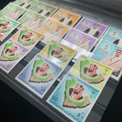 طابع مرور 50 عام على توحيد المملكة ومبايعة الملك ف...