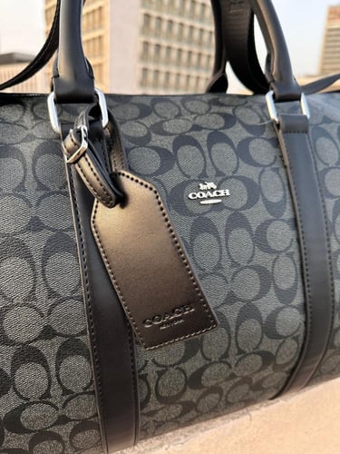 شنطه هاند باق رجالي نسائي كوتش