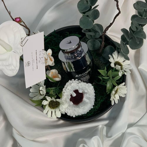 عطر أدونيس رجالي بتنسيق ورد