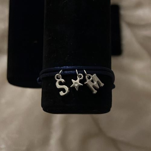 أسوارة حرفين ونجمة