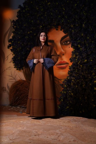 عباية- أسدام