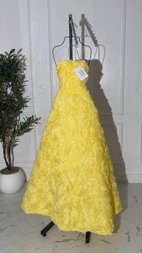 فستان سهرة اصفر كلوش برباط خلفي