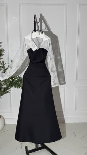 فستان اسود مع ورود باللون الابيض