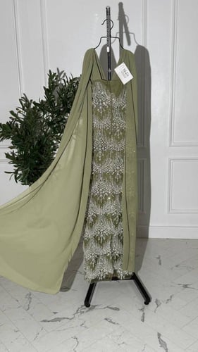 فستان جورجيت أخضر مطرز بشك فاخر وأناقة فريدة