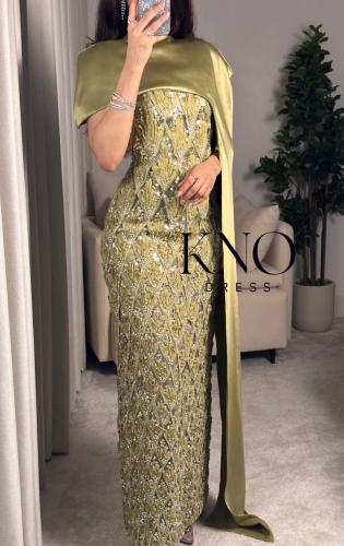 فستان سهرة ذهبي بقطعتين وتطريز فاخر وتفتة