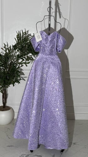 فستان كردانة موف فاخر بكورسِيه وجيوبن أنيق