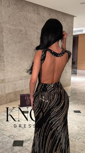 فستان بخامة شك فاخر خاص بلمسة أنيقة ولمعان راقٍ يب...