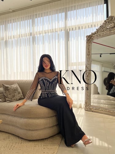 فستان سهرة اسود بكم حيران