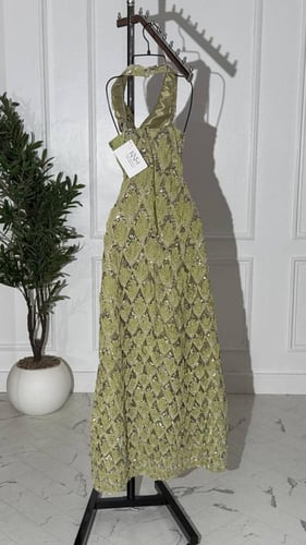 فستان سهرة اخضر طويل ب تل مطرز