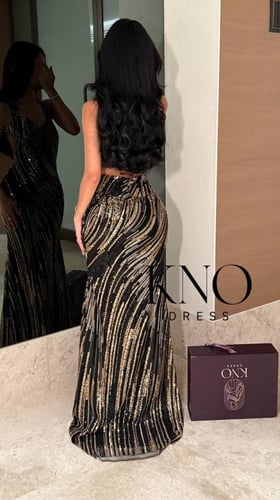 فستان بخامة شك فاخر خاص بلمسة أنيقة ولمعان راقٍ يب...