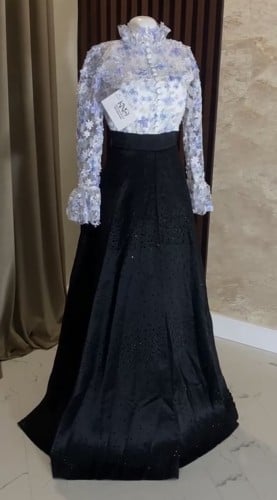 فستان فاتن سهرة دانتيل أسود وأبيض فخم