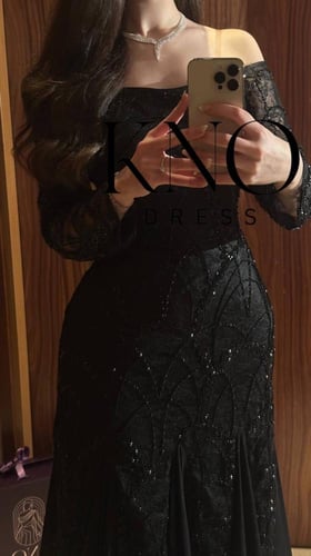 فستان دانتيل أسود فاخر بتطريز شك وجورجيت شيفون