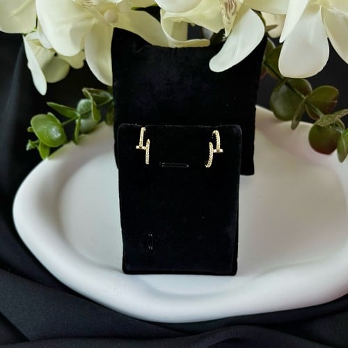 حلق ذهبي تصميم (Cartier)