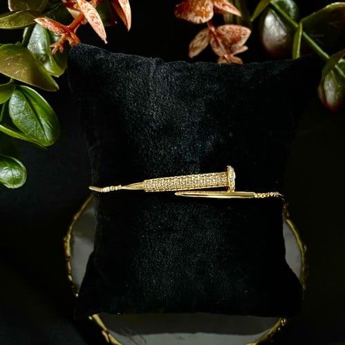 إسواره ذهبي تصميم ( Cartier )