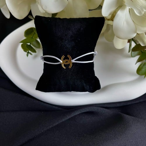 إسوارة CHANEL (خيط فضي )