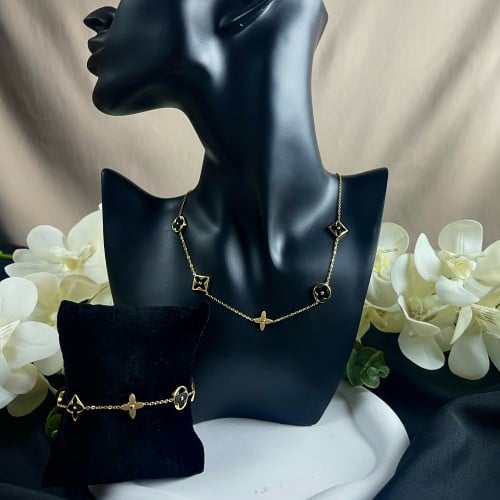 طقم سلسال وإسواره تصميم ( LV )