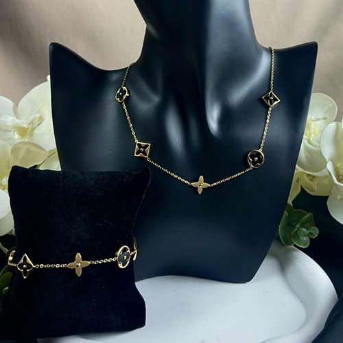 طقم سلسال وإسواره تصميم ( LV )