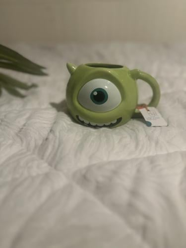 A mug with a whispering design