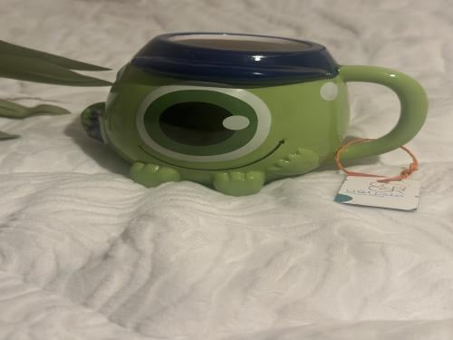 A mug with a whispering design