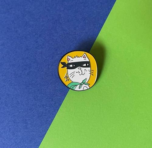 Ben's distinctive pin