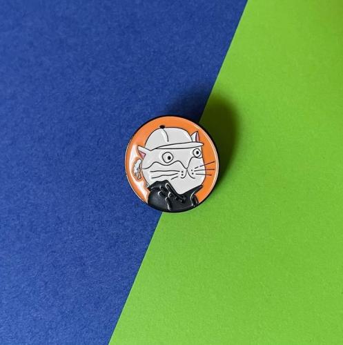 Ben's distinctive pin