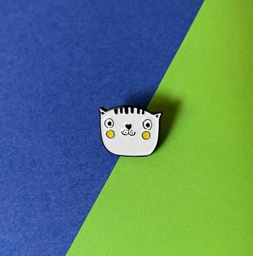 Ben's distinctive pin