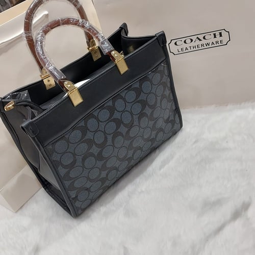 شنطه نسائي راقي تصميم كوتش