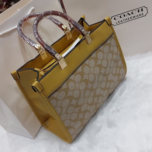 شنطه نسائي راقي تصميم كوتش